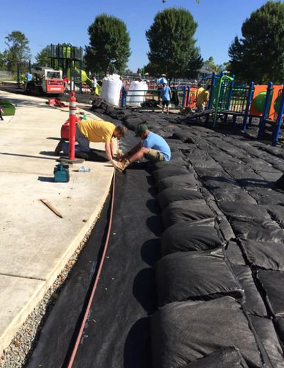 Crew installing Smarte Bag Substrate Installation